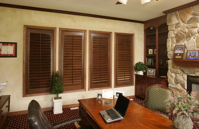 Wooden plantation shutters in a San Antonio home office Wooden plantation shutters in a San Antonio home office